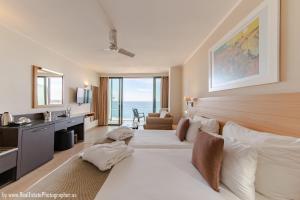 Кровать или кровати в номере The Preluna Hotel