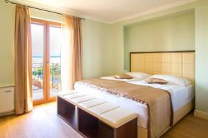Postel nebo postele na pokoji v ubytování Luxury Apartments Villa Matea