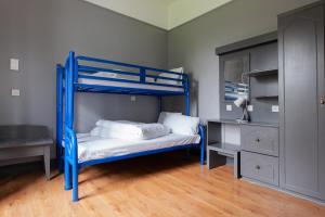 A bed or beds in a room at The Burren Hostel - Sleepzone