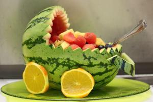 a watermelon cut in half with fruit in it at Kapitaenshaus-Lassen-Zimmer-Bounty in Westerland (Sylt)