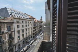 a view of a city street from a building at Fontanella Green House in Barcelona