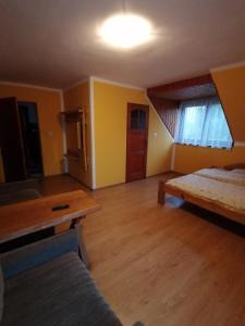 Posteľ alebo postele v izbe v ubytovaní Pokoje Gościnne Alexandra