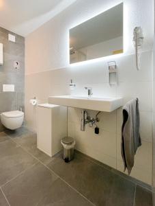 Koupelna v ubytování Hegau Boardinghouse