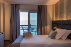 Postel nebo postele na pokoji v ubytování Inex Olgica Hotel & SPA