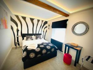 Katil atau katil-katil dalam bilik di The Cherry Tree Hotel