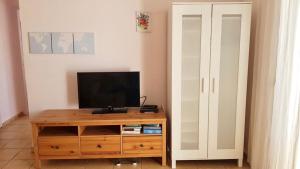 Telewizja i/lub zestaw kina domowego w obiekcie Apartment Avenida Puig