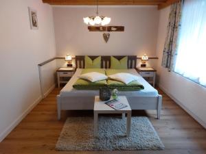 A bed or beds in a room at Piz Buin