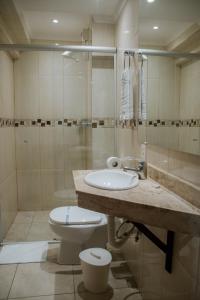 Koupelna v ubytování Hotel Masseilot