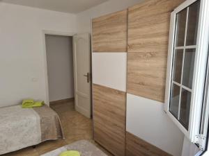 Postel nebo postele na pokoji v ubytování Casa Olivina