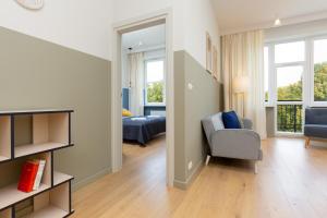 Posteľ alebo postele v izbe v ubytovaní Apartments Warsaw Gagarina by Noclegi Renters