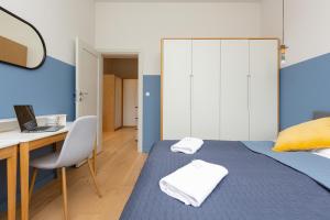 Posteľ alebo postele v izbe v ubytovaní Apartments Warsaw Gagarina by Noclegi Renters