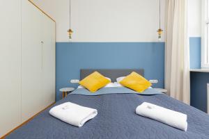 Posteľ alebo postele v izbe v ubytovaní Apartments Warsaw Gagarina by Noclegi Renters