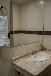 Koupelna v ubytování Hotel Masseilot