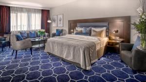 Voodi või voodid majutusasutuse Athlone Springs Hotel toas