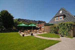 Photo de la galerie de l'établissement Hotel und Restaurant Petit Robby, à Wenningstedt