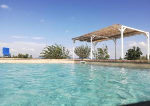 The swimming pool at or close to Borgo Solario