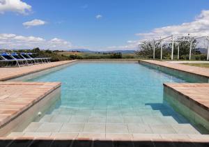 The swimming pool at or close to Borgo Solario
