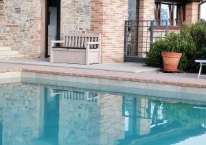 The swimming pool at or close to Borgo Solario