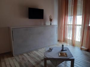 TV a/nebo společenská místnost v ubytování Appartamento Sophia