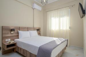Postel nebo postele na pokoji v ubytování Orea Homes