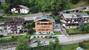 an aerial view of a large house in a city at Villa Hubertus in Ortisei