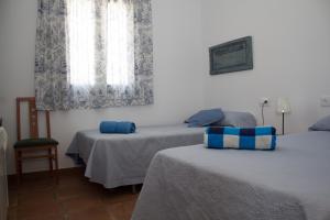 A bed or beds in a room at Mirador del Sotillo