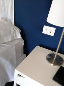 A bed or beds in a room at I DIOSCURI