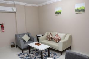 Royal Land Deluxe Suites رويال لاند للأجنحة الفاخرة的休息区