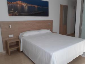 Postel nebo postele na pokoji v ubytování Hotel Iberflat Marynton