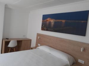 Postel nebo postele na pokoji v ubytování Hotel Iberflat Marynton