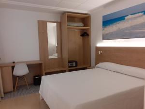 Postel nebo postele na pokoji v ubytování Hotel Iberflat Marynton