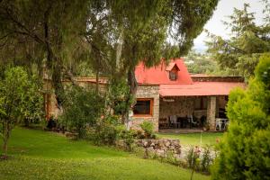 Casa Rural Santa Maria Regla tesisinin dışında bir bahçe