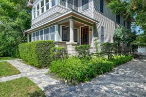 a house with a brick driveway in front of it at 16 Saragossa Street B in St. Augustine