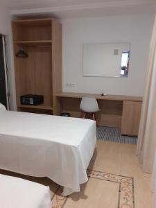 Postel nebo postele na pokoji v ubytování Hotel Iberflat Marynton