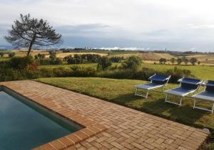 The swimming pool at or close to Borgo Solario