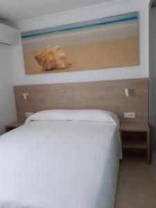 Postel nebo postele na pokoji v ubytování Hotel Iberflat Marynton