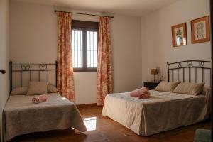 A bed or beds in a room at Mirador del Sotillo Még 27 kép