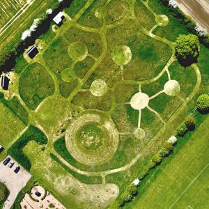 an overhead view of a park with trees and bushes at The Oaks Glamping - Rubie's Shepherds Hut in Colkirk