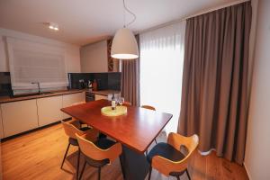 Kuchyň nebo kuchyňský kout v ubytování Apartmani Diklo