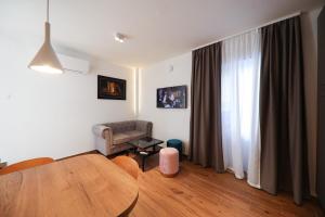 TV a/nebo společenská místnost v ubytování Apartmani Diklo