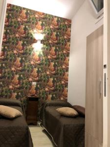 Postel nebo postele na pokoji v ubytování La casetta
