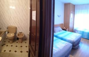 Ванна кімната в Hospedaje Covadonga