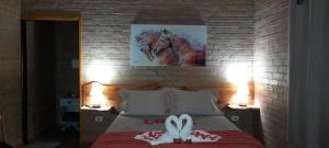 Postel nebo postele na pokoji v ubytování Refúgio Horse