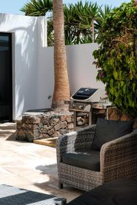 A seating area at Casa Paloma with heated pool in El Roque