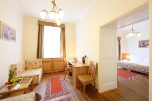 Postel nebo postele na pokoji v ubytování Hotel Historia & Historante