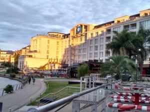 a large building with a hotel in the background at Bahía Grande Nordelta - con Cochera in Benavídez