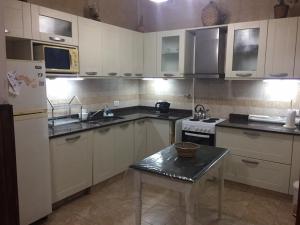 Η κουζίνα ή μικρή κουζίνα στο CASA NONI +26 φωτογραφίες