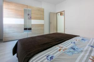 Posteľ alebo postele v izbe v ubytovaní Apartment DANIJEL