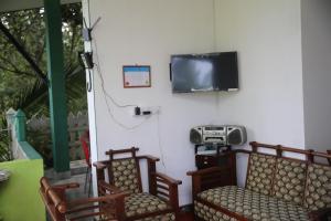 TV a/nebo společenská místnost v ubytování 9 Arch view rest inn