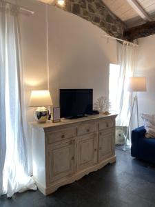 TV a/nebo společenská místnost v ubytování La Polena Camere Vernazza - Carattino Apartment + 20 fotografií